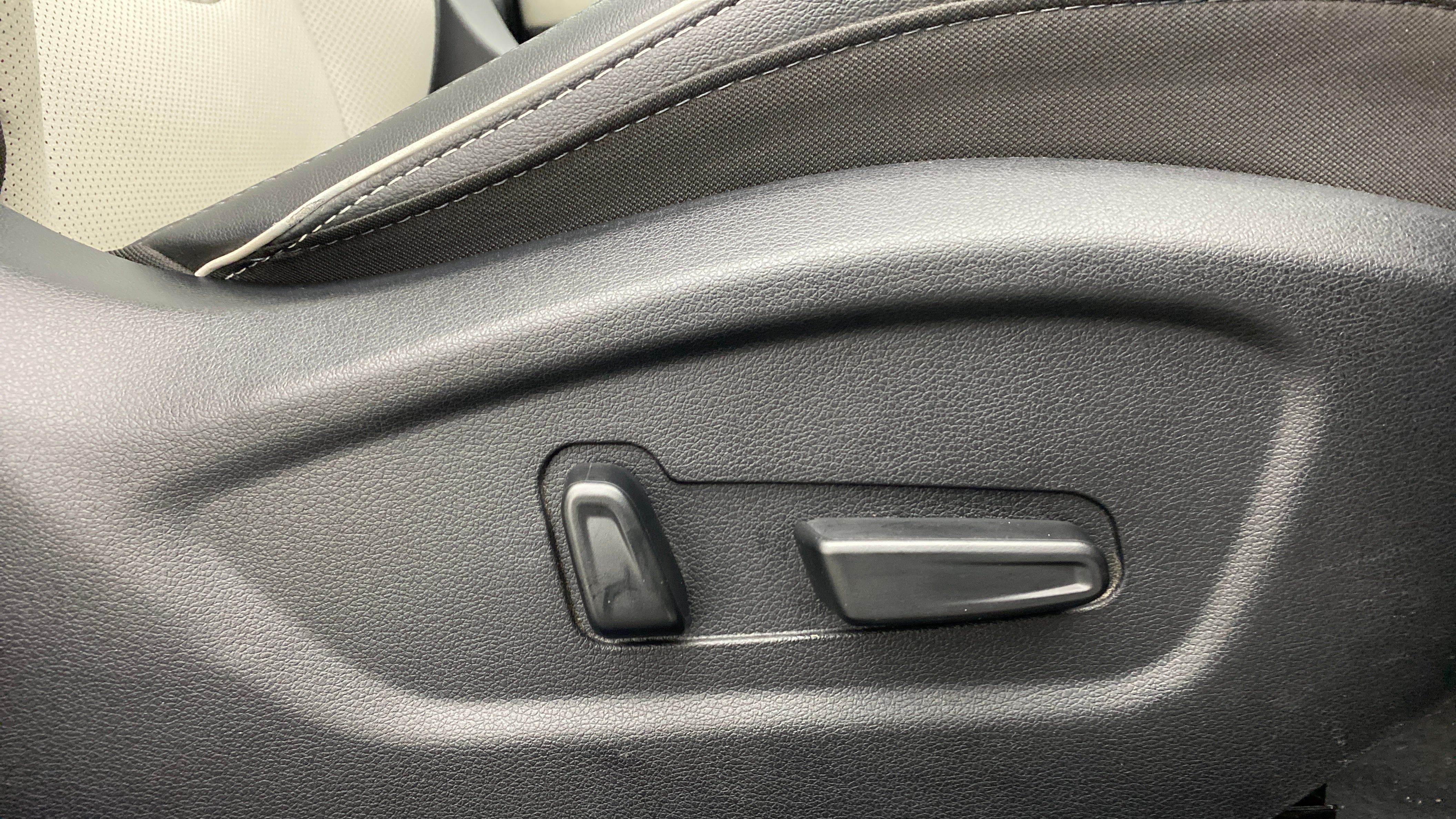 Close-up of seat adjustment controls of a Hyundai Creta 2018-2023