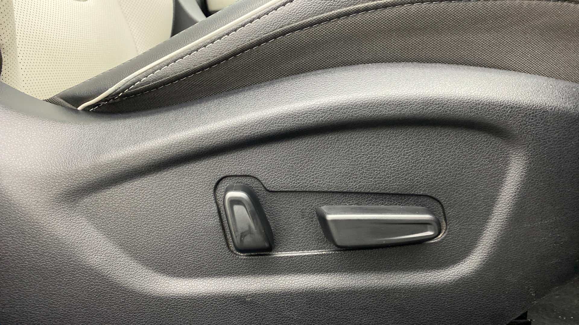 Close-up of seat adjustment controls of a Hyundai Creta 2018-2023