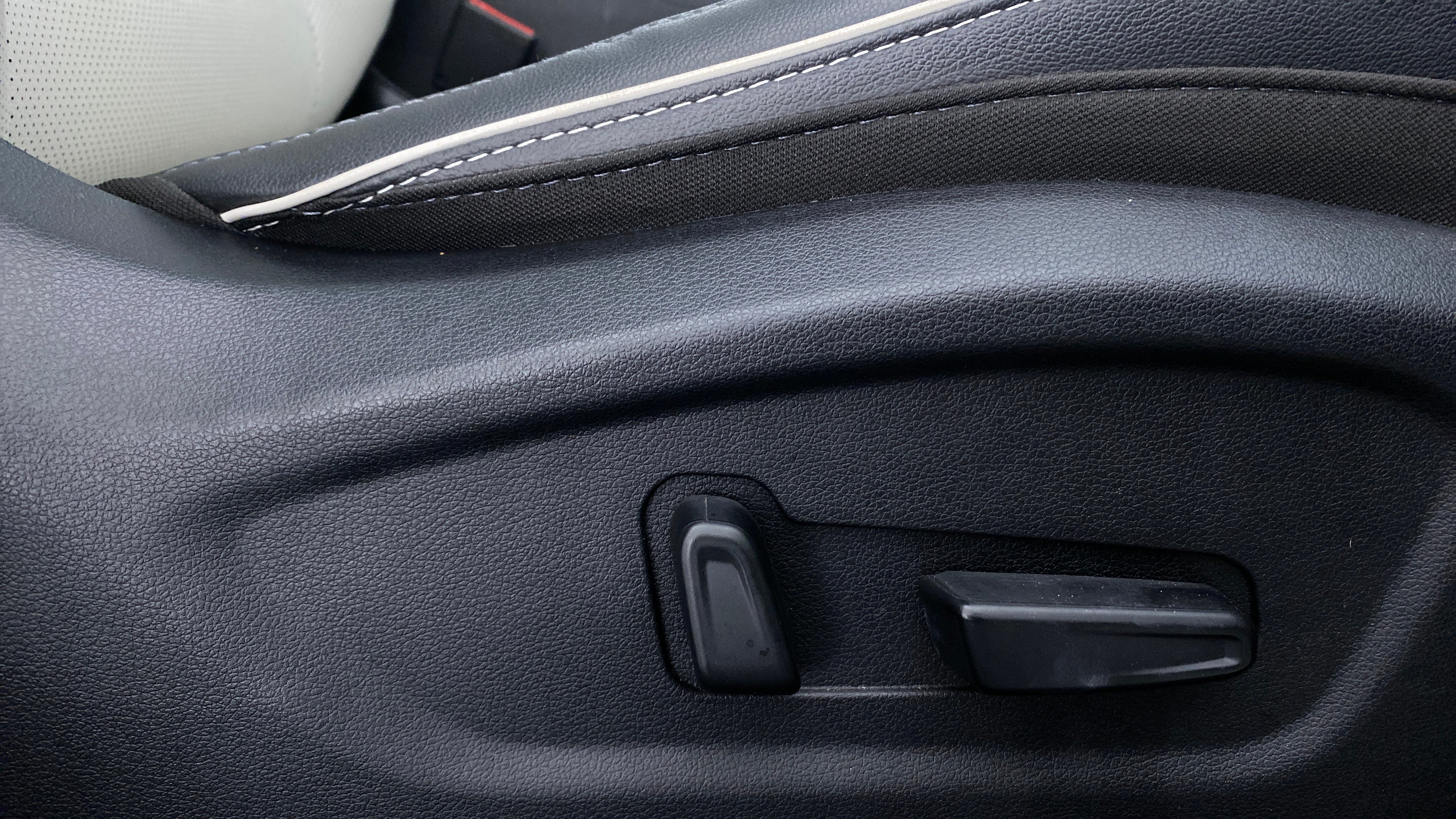 Close-up of seat adjustment controls of a Hyundai Creta 2018-2023