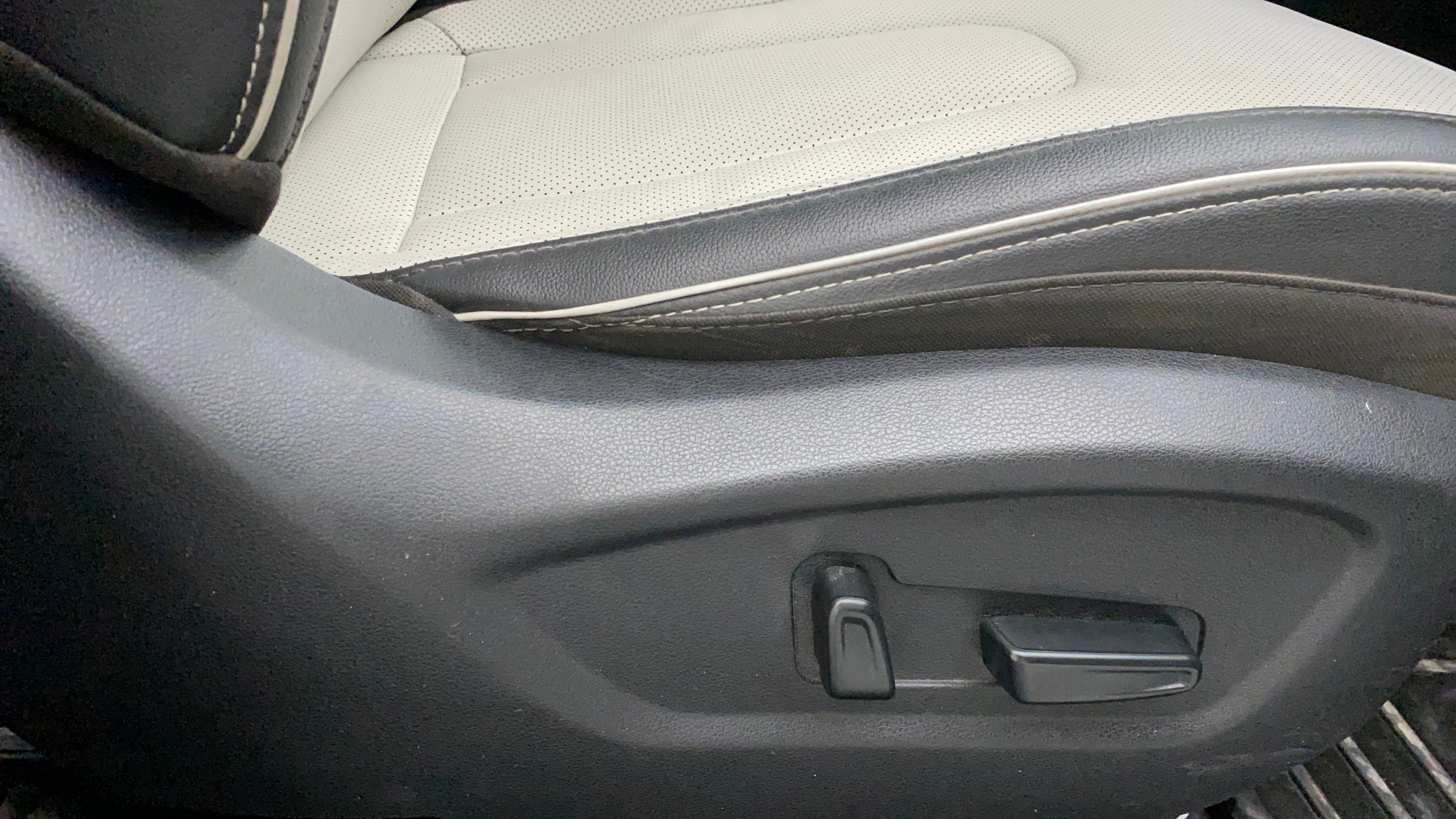 Close-up of the seat side adjustment controls of a Hyundai Creta 2018-2023