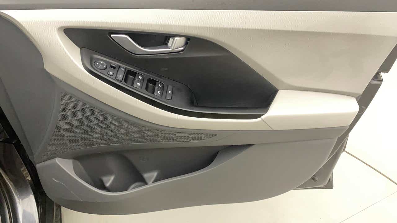 Interior driver door panel of a Hyundai Creta