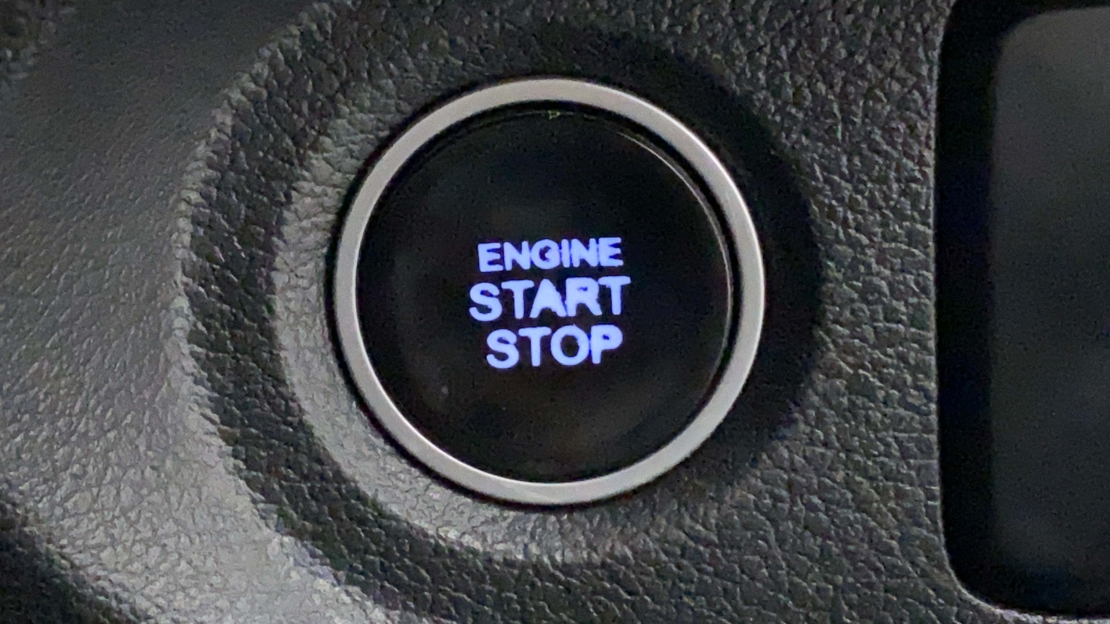 Close-up of the engine start stop button in a Hyundai Creta 2018-2023