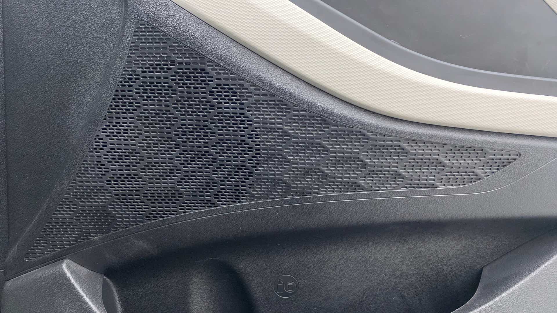 Speaker grille on the interior door panel of a Hyundai Creta 2018-2023