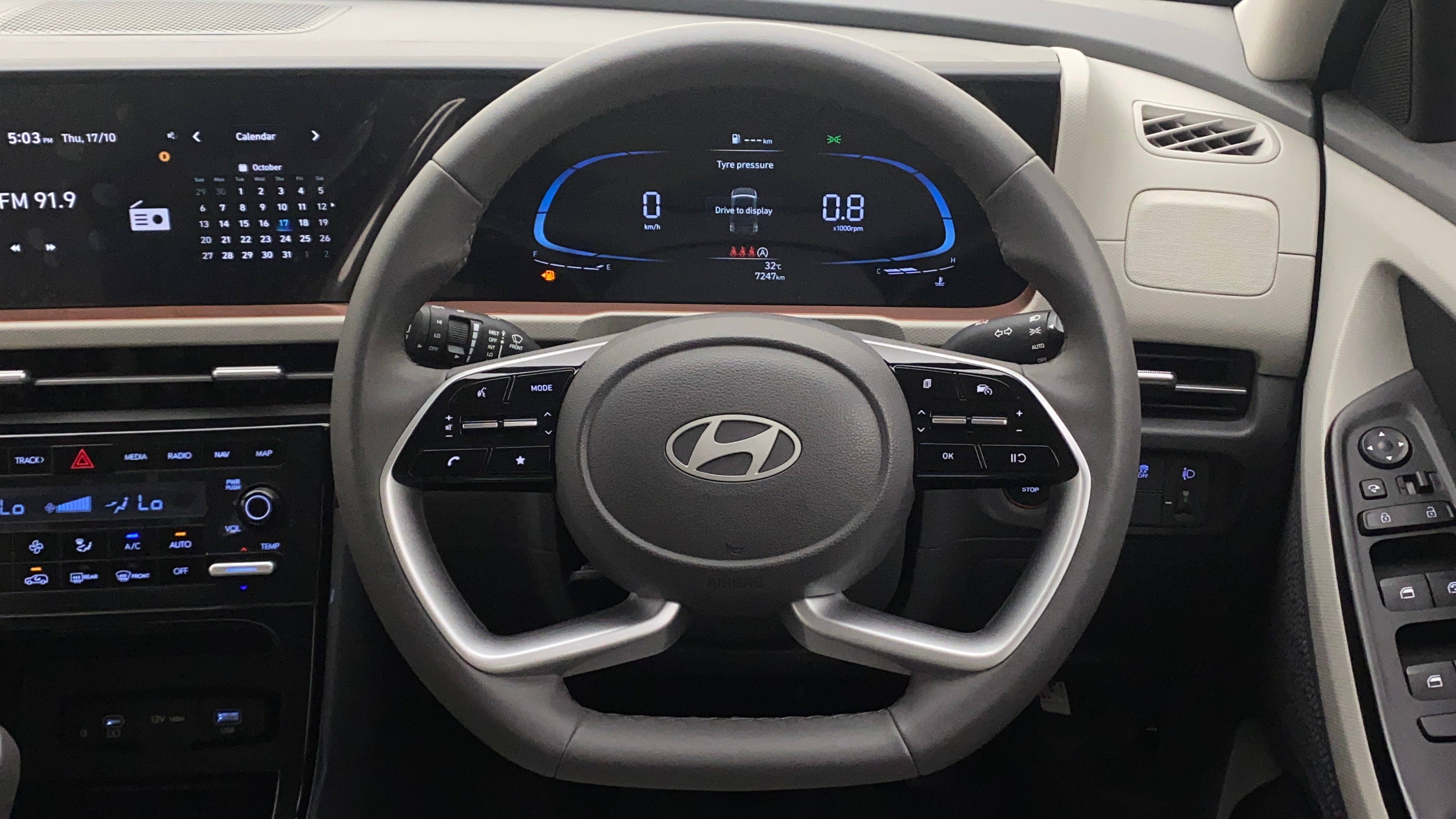 Interior dashboard and steering wheel of a Hyundai Creta