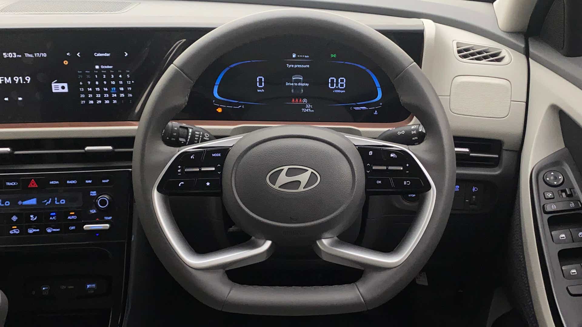 Interior dashboard and steering wheel of a Hyundai Creta