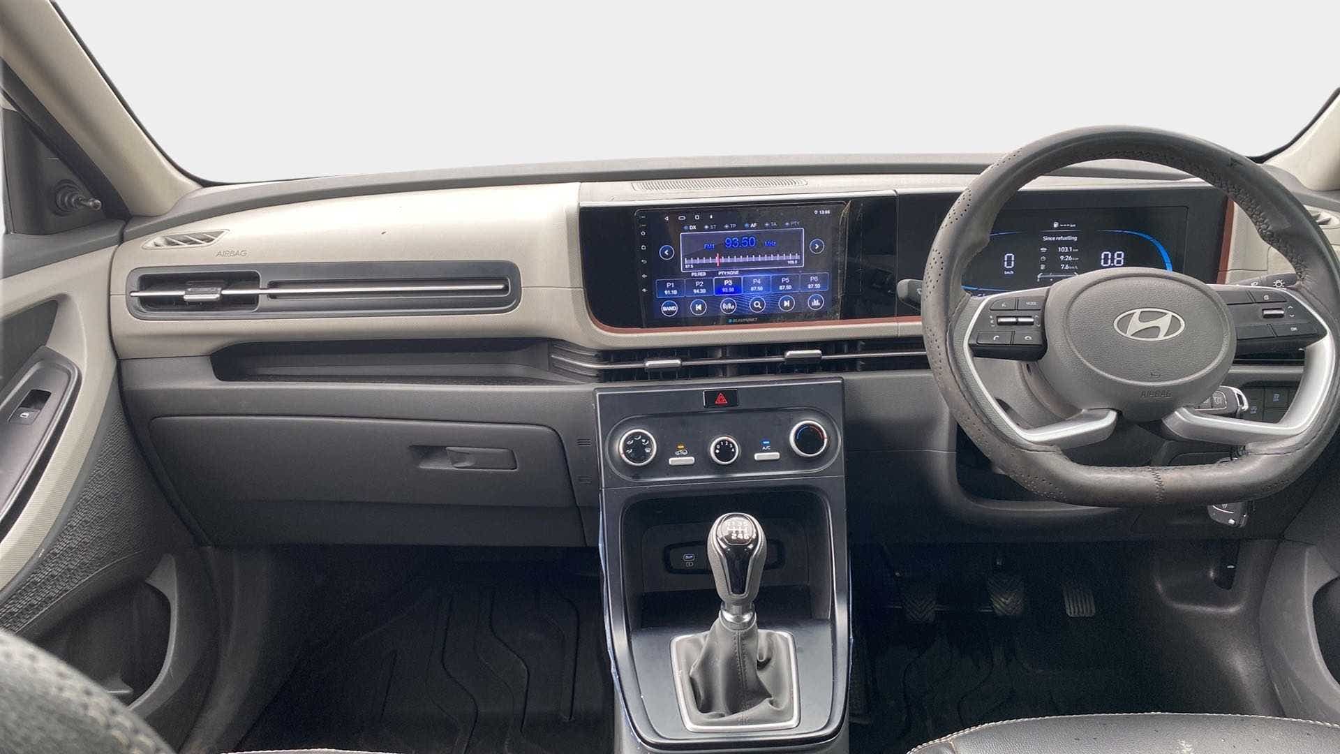 Interior dashboard and steering wheel of a Hyundai Creta