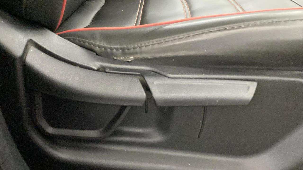 Close-up of a seat adjustment lever of a Hyundai Creta 2018-2023
