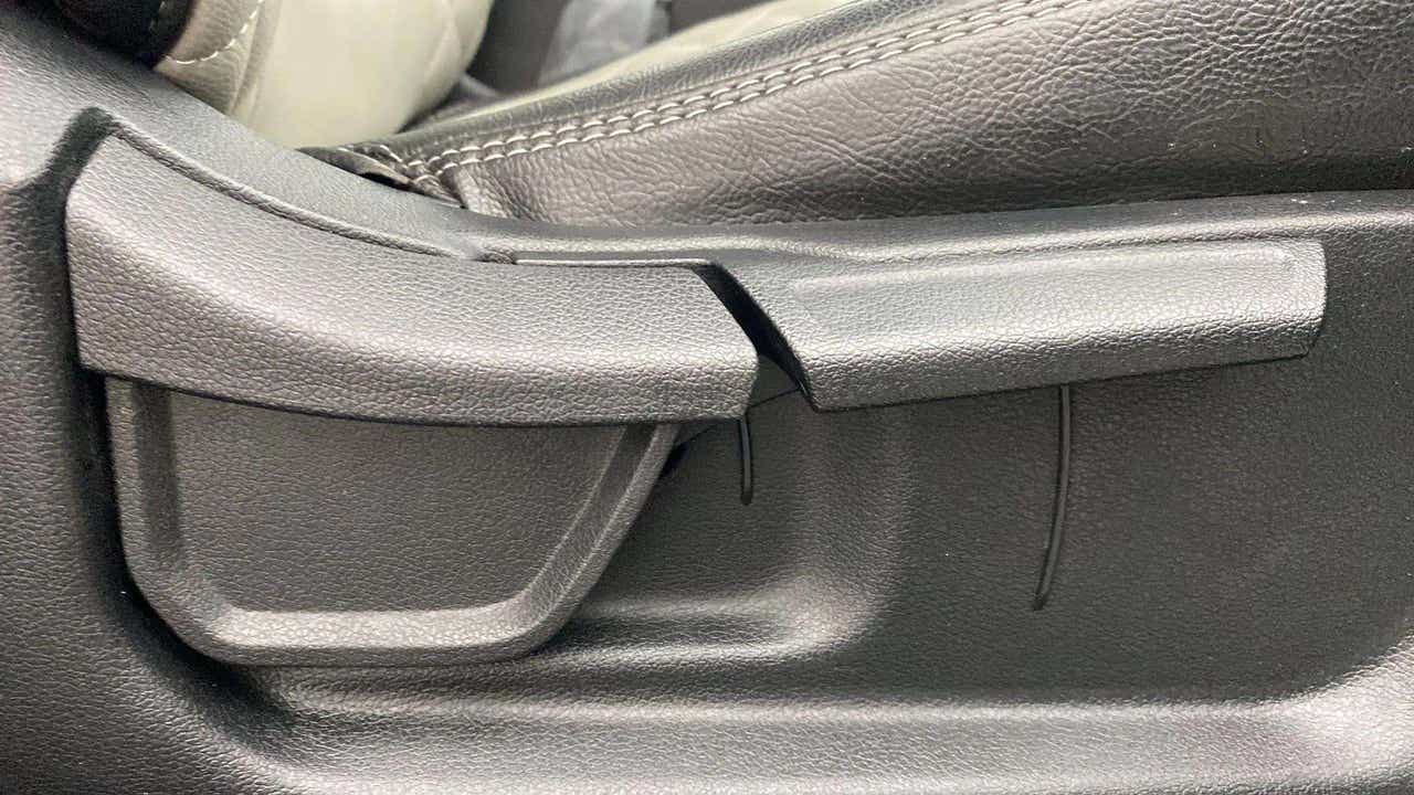 Seat adjustment lever close-up of a Hyundai Creta 2018-2023