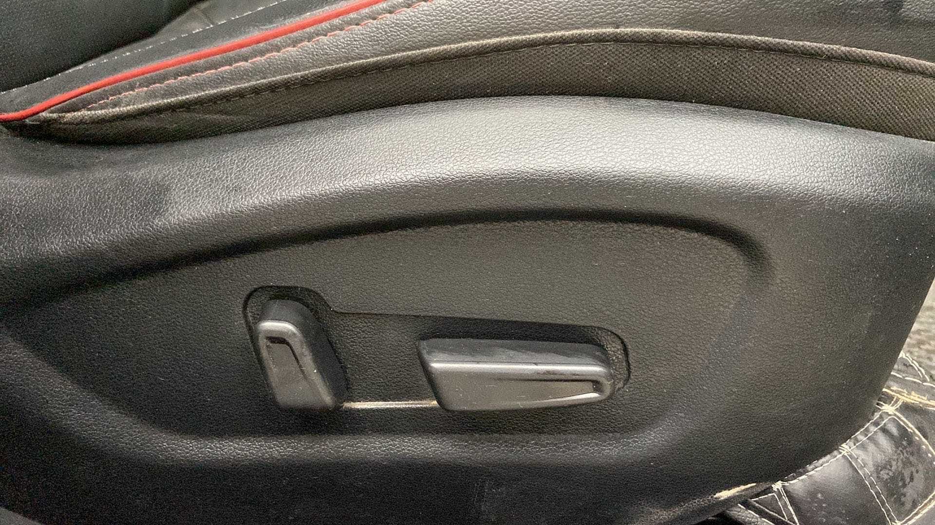 Close-up of a seat adjustment control of a Hyundai Creta 2018-2023