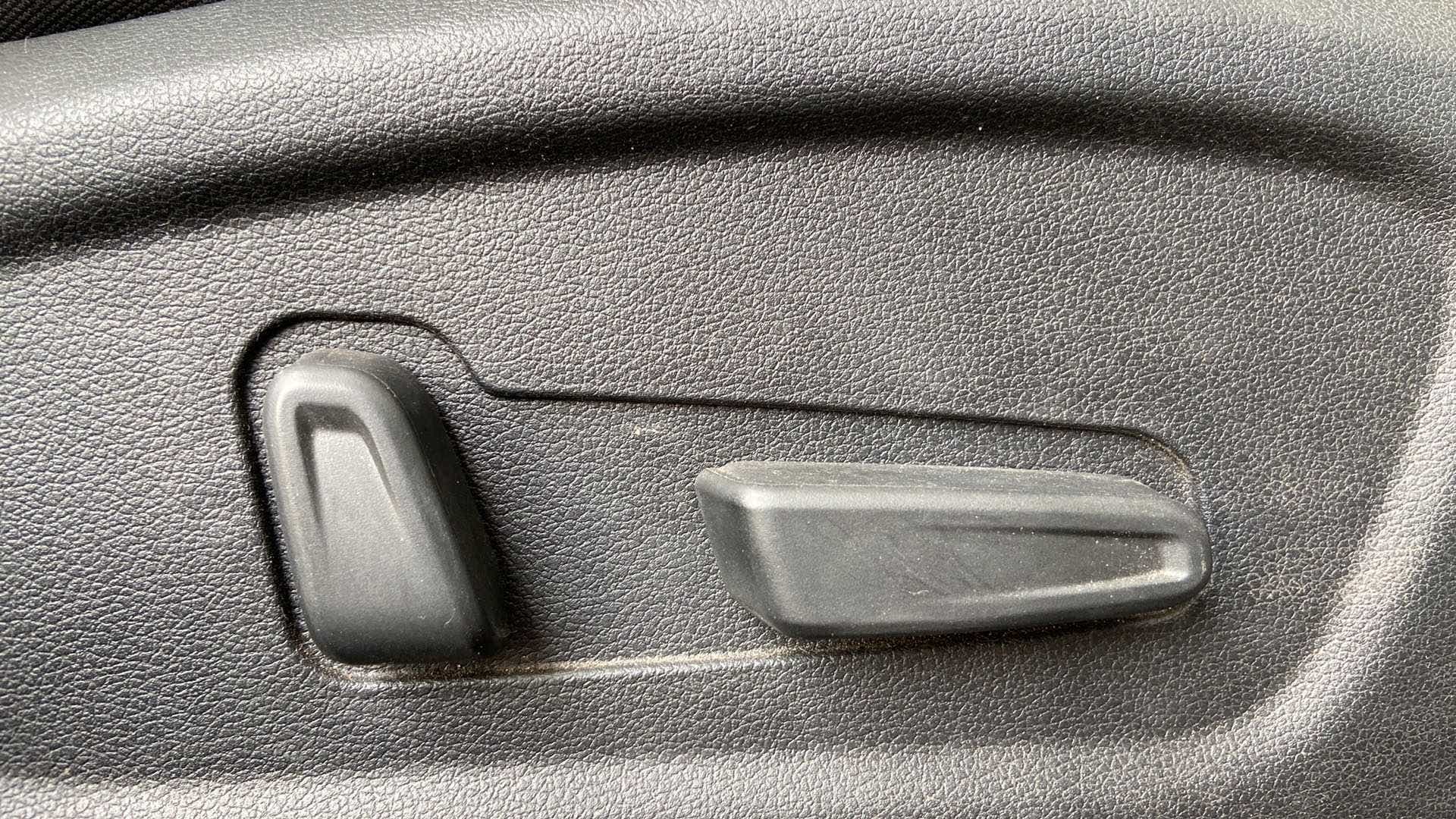 Close-up of seat adjustment controls of a Hyundai Creta 2018-2023