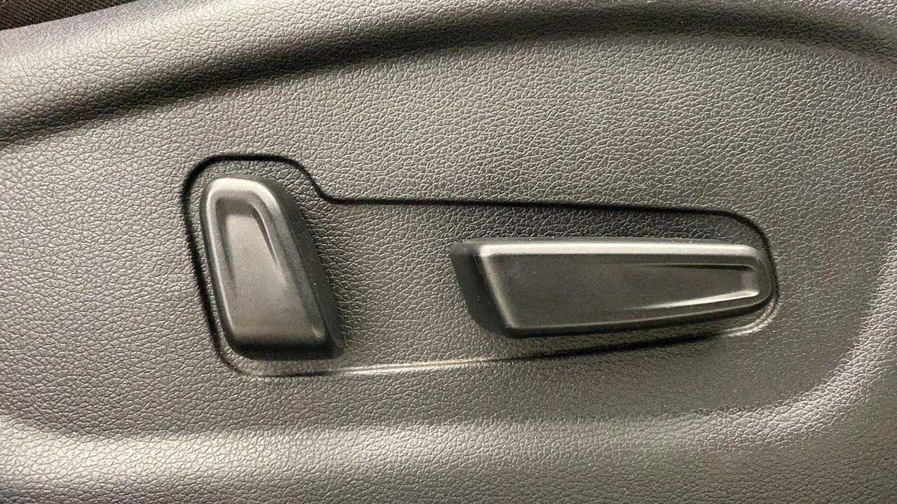 Close-up of a seat adjustment control in a Hyundai Creta 2018-2023