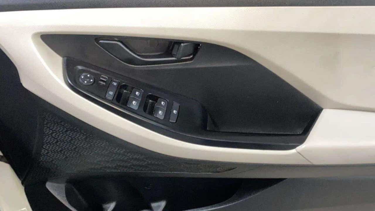 Driver side interior door controls of a Hyundai Creta 2018-2023