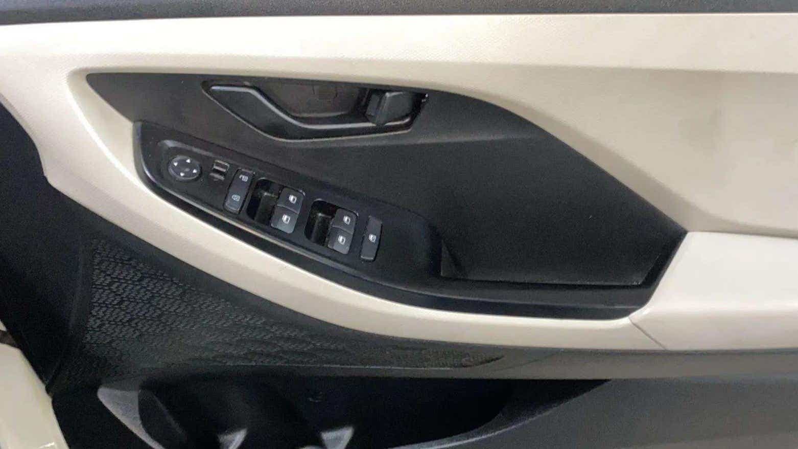 Driver side interior door controls of a Hyundai Creta 2018-2023