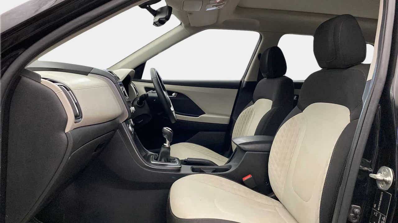 Interior dashboard and front seats of a Hyundai Creta 2018-2023