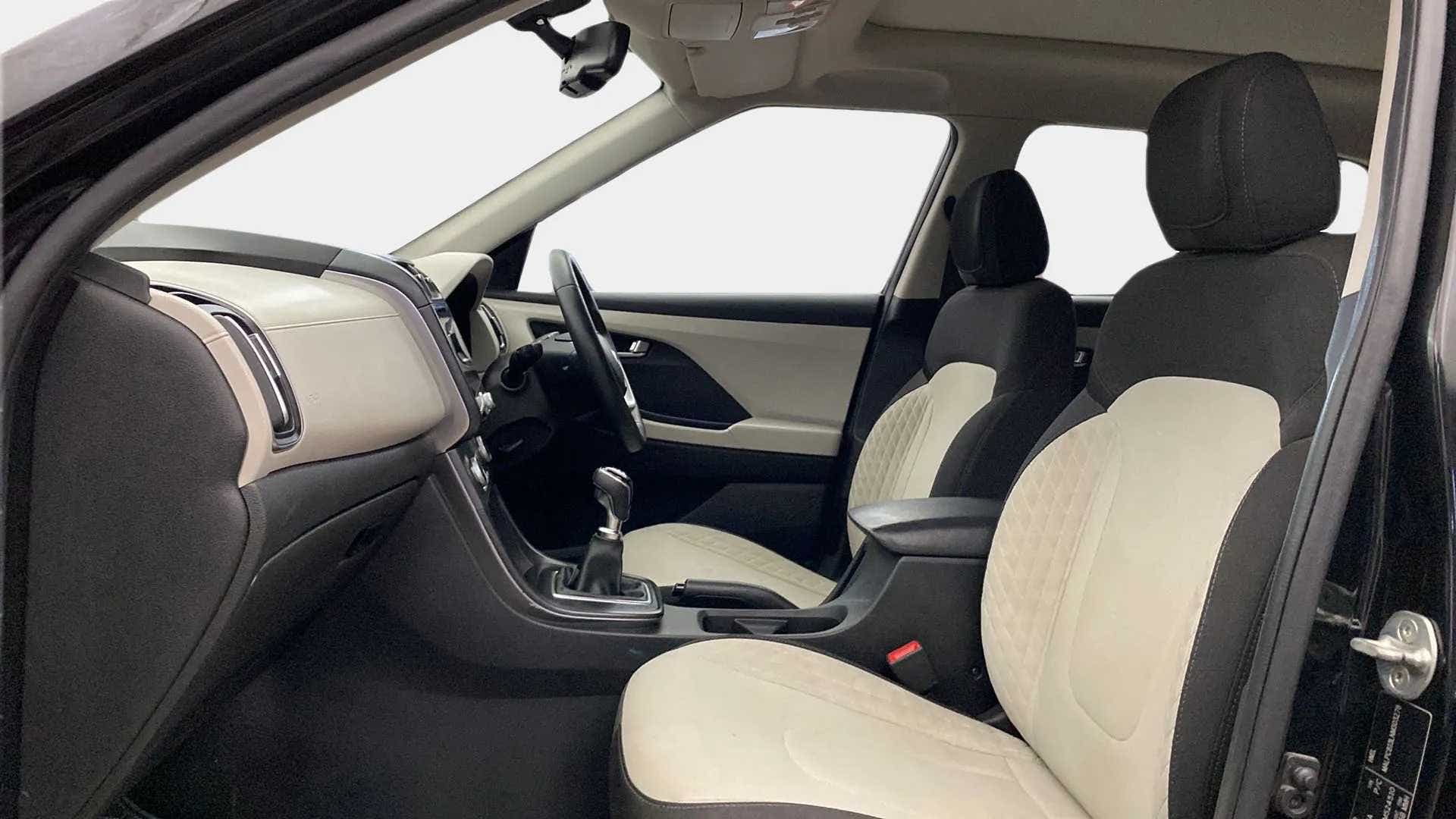 Interior dashboard and front seats of a Hyundai Creta 2018-2023