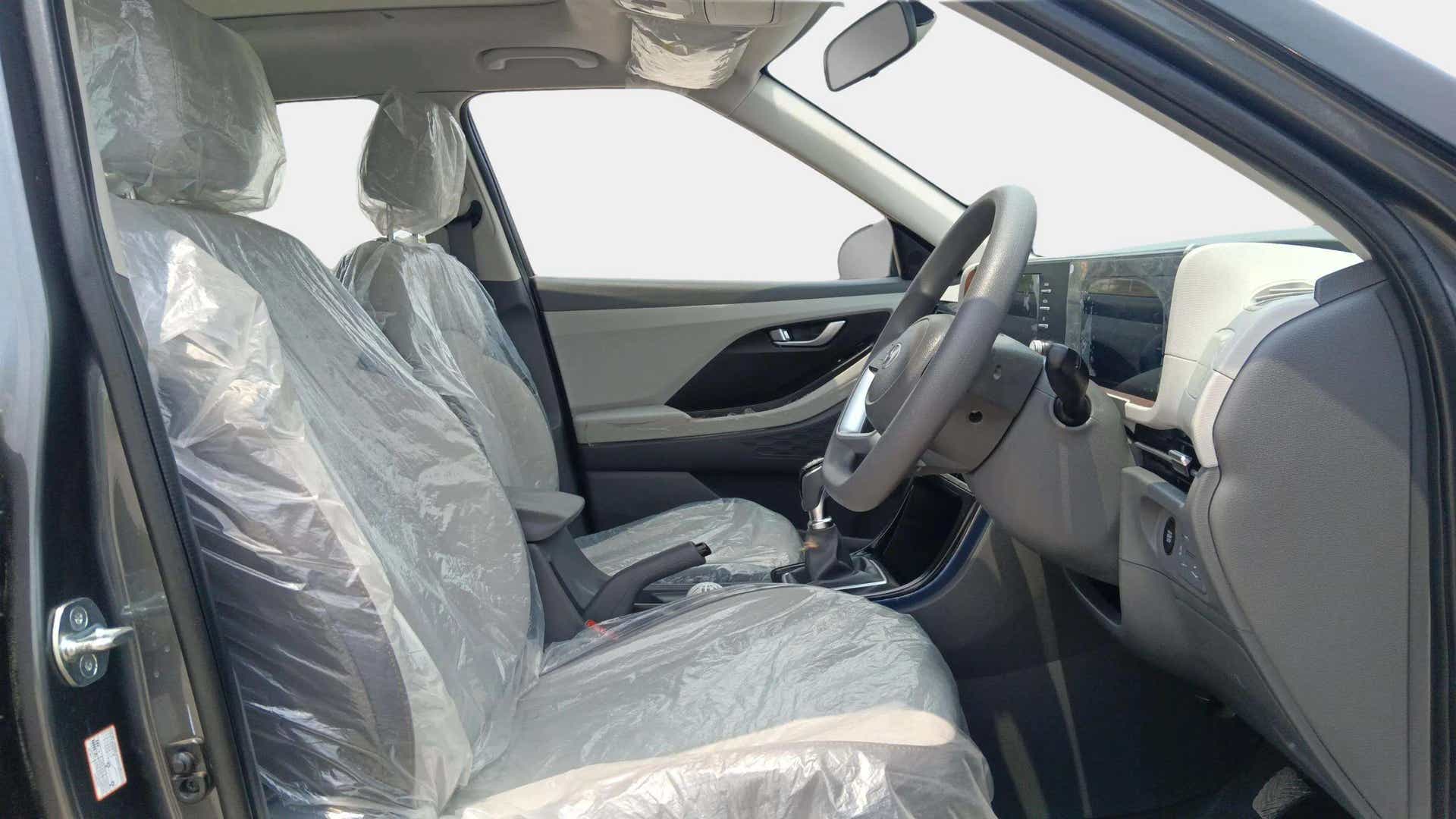 Interior front seats and dashboard of a Hyundai Creta