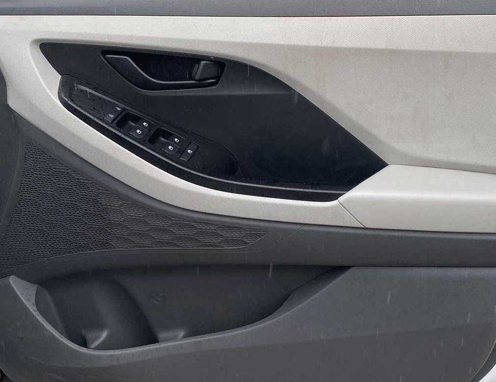 Interior driver-side door panel of a Hyundai Creta