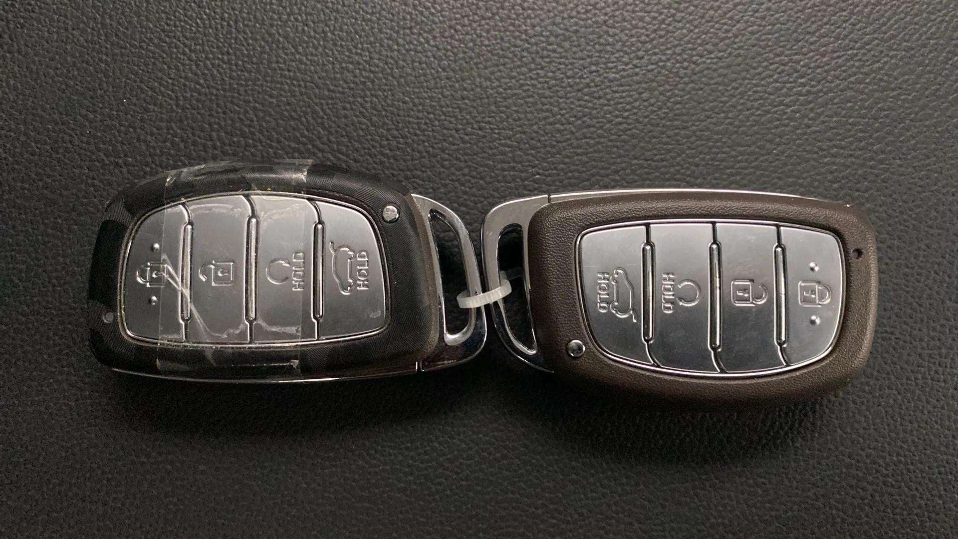 Close-up view of car key fobs for a Hyundai Creta 2018-2023