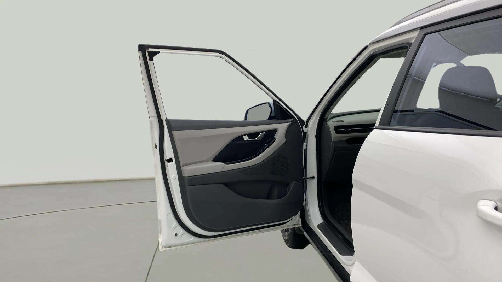 Front driver side door open view of a Hyundai Creta