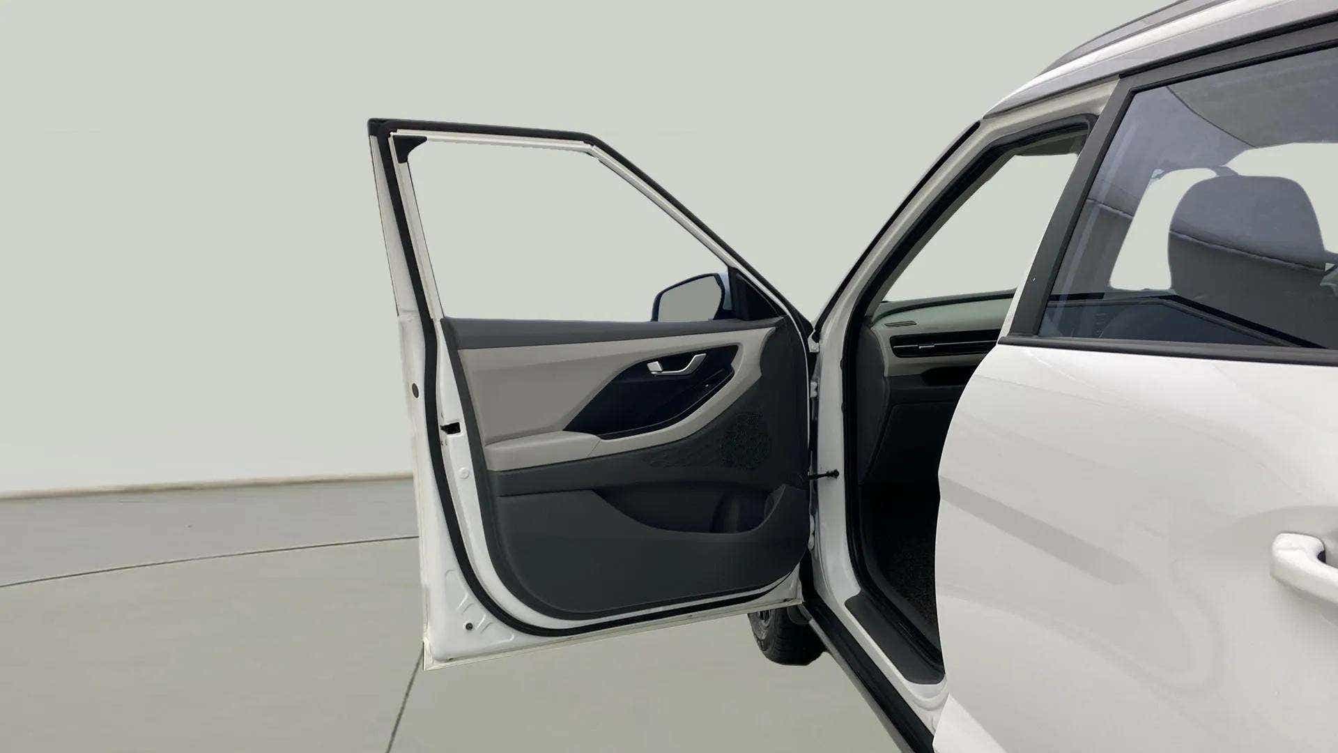Front driver side door open view of a Hyundai Creta