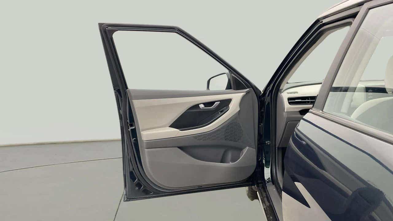 Open front driver-side door of a Hyundai Creta