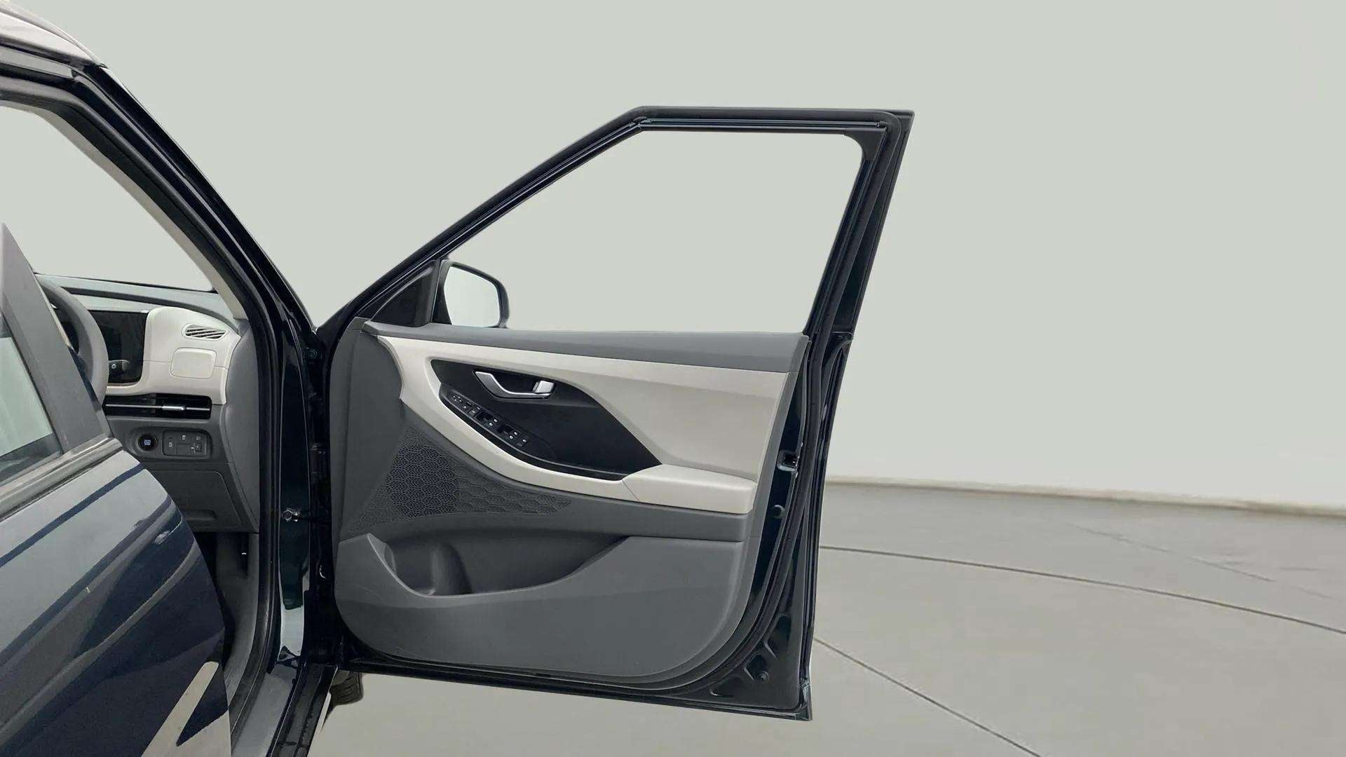 Driver side door and interior view of a Hyundai Creta