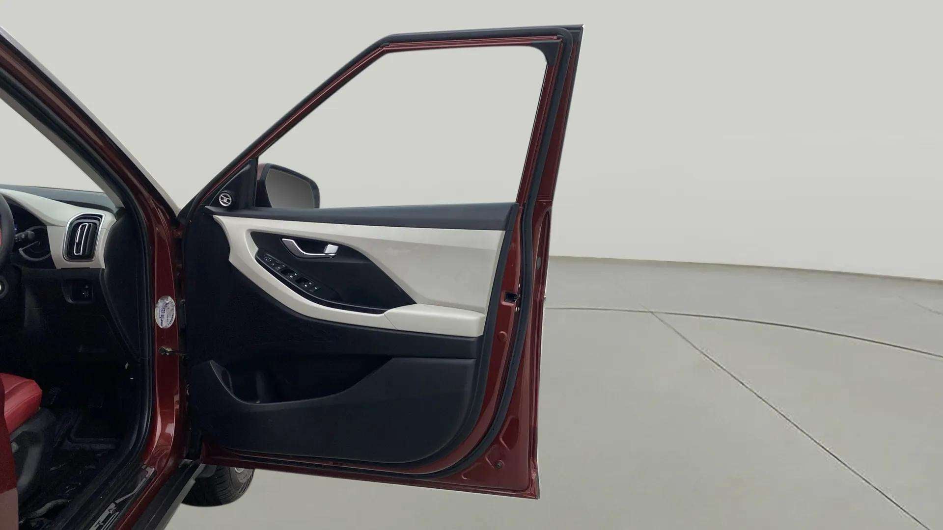 Driver door and dashboard view of a Hyundai Creta 2018-2023