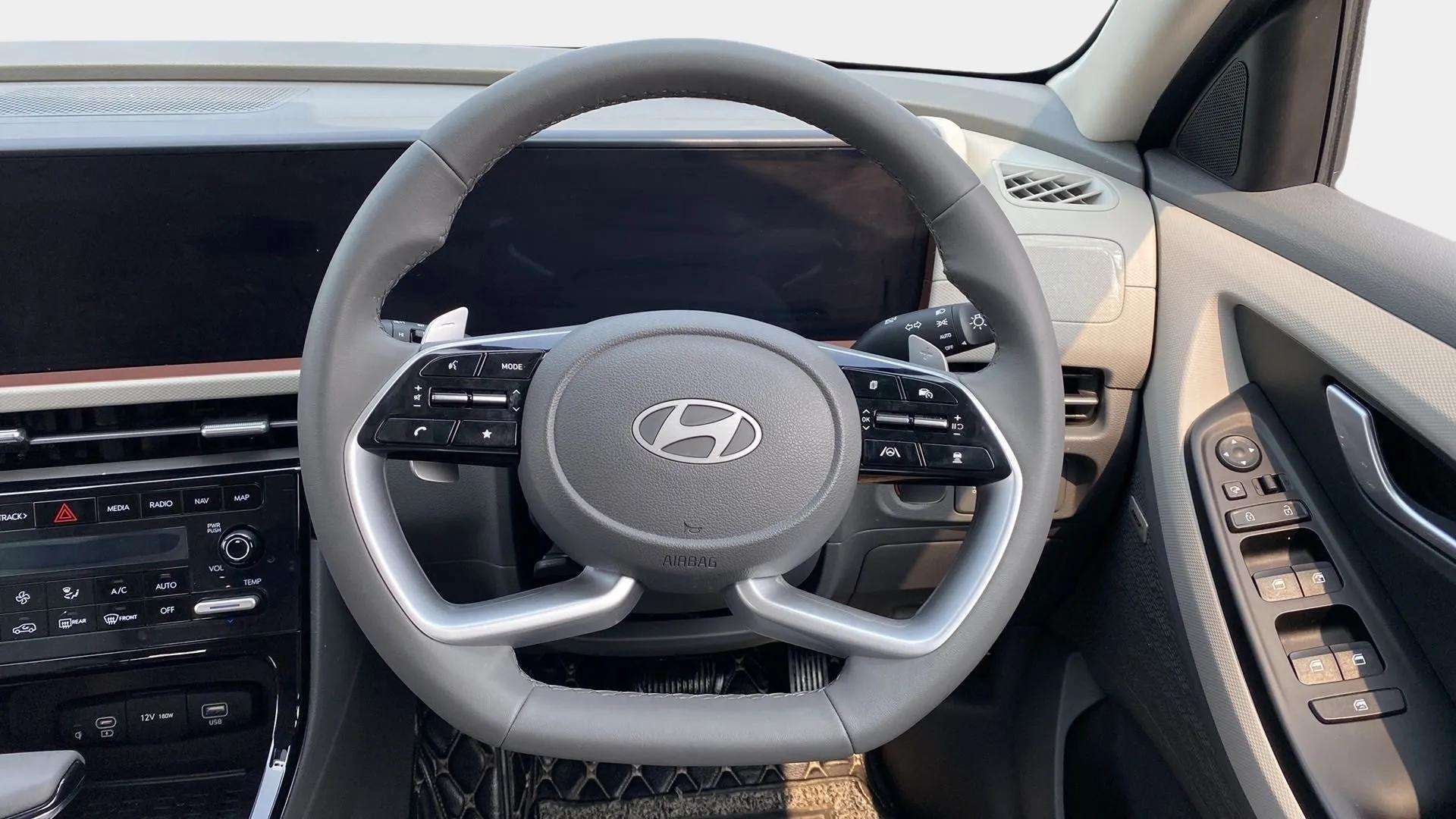 Interior dashboard and steering wheel of a Hyundai Creta