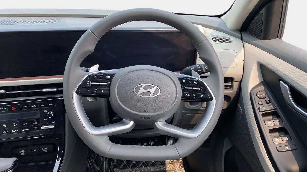 Interior dashboard and steering wheel of a Hyundai Creta