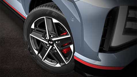 Front wheel and fender detail of a Hyundai Venue N Line Facelift