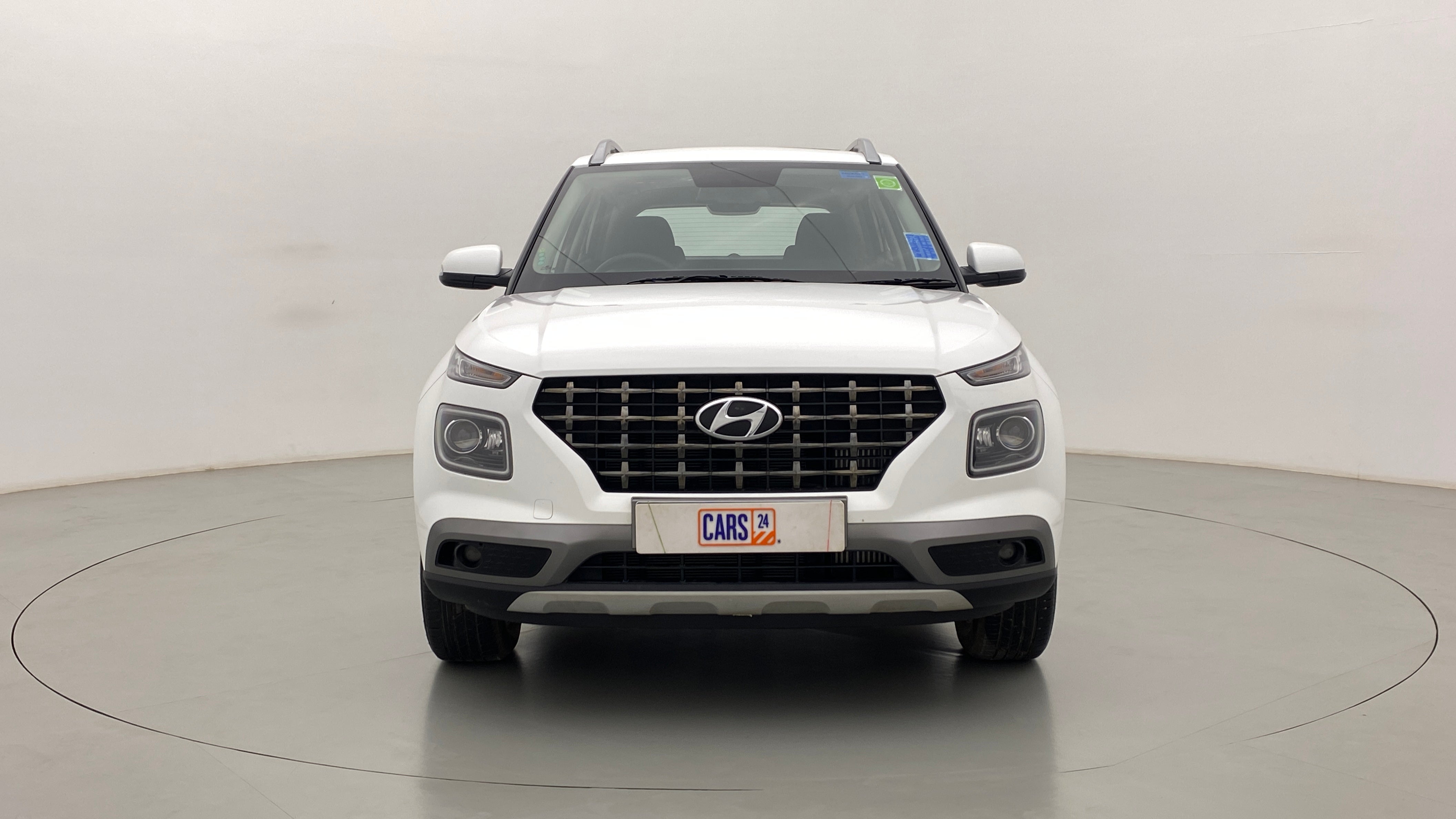 Front view of a Atlas White Hyundai Venue