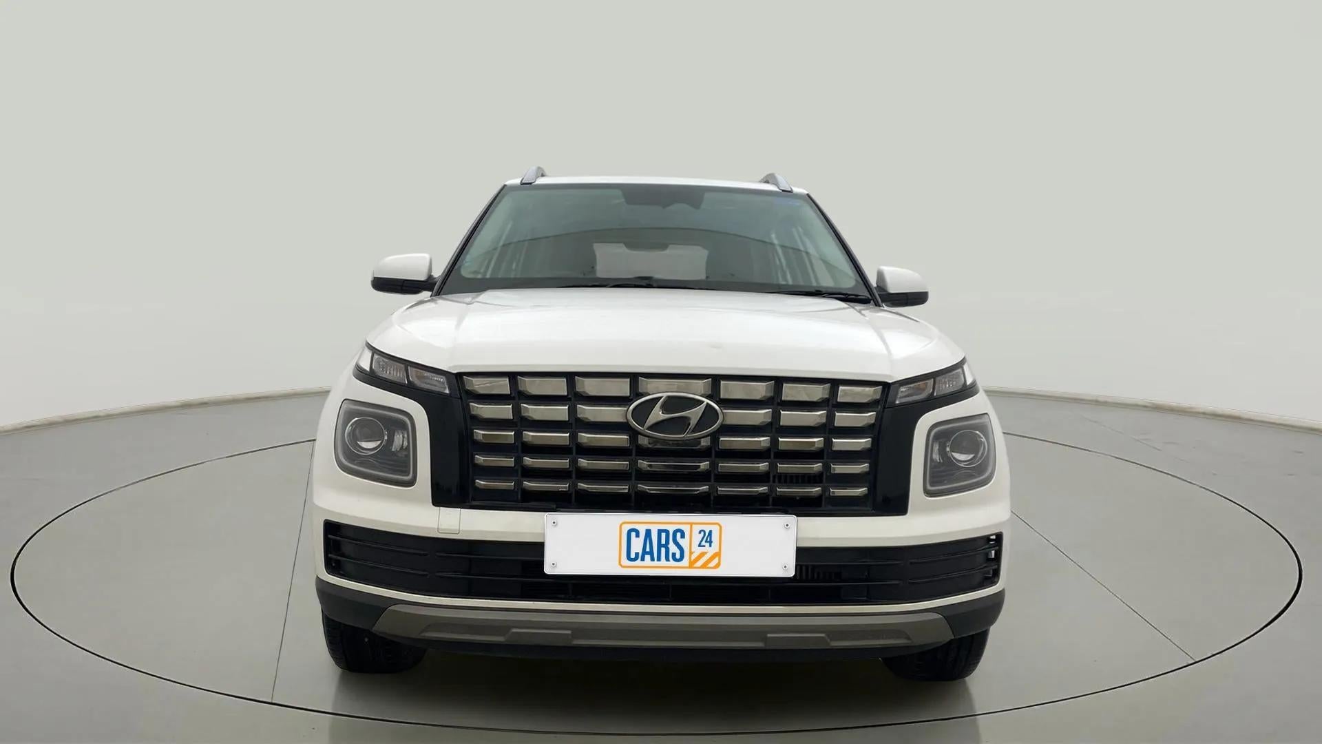 Front view of a Atlas White Hyundai Venue