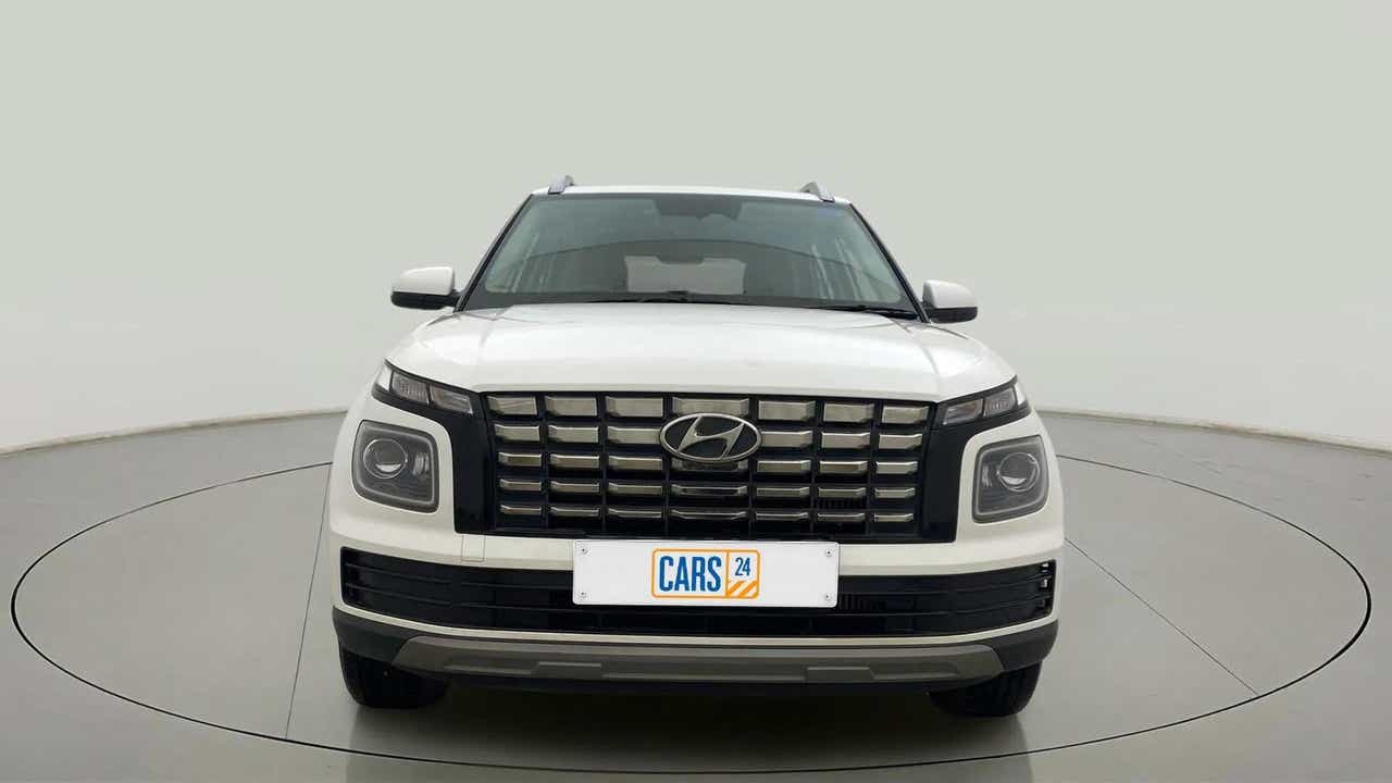 Front view of a Atlas White Hyundai Venue