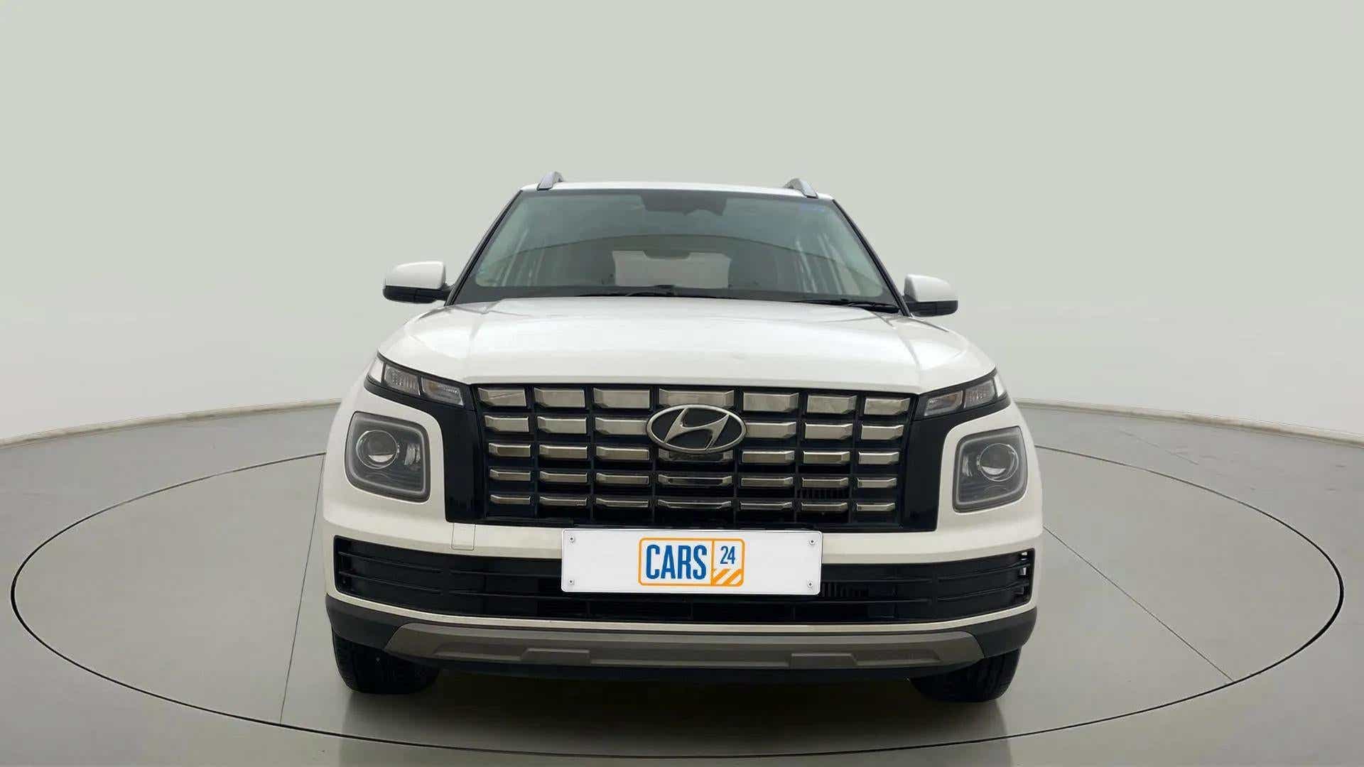 Front view of a Atlas White Hyundai Venue