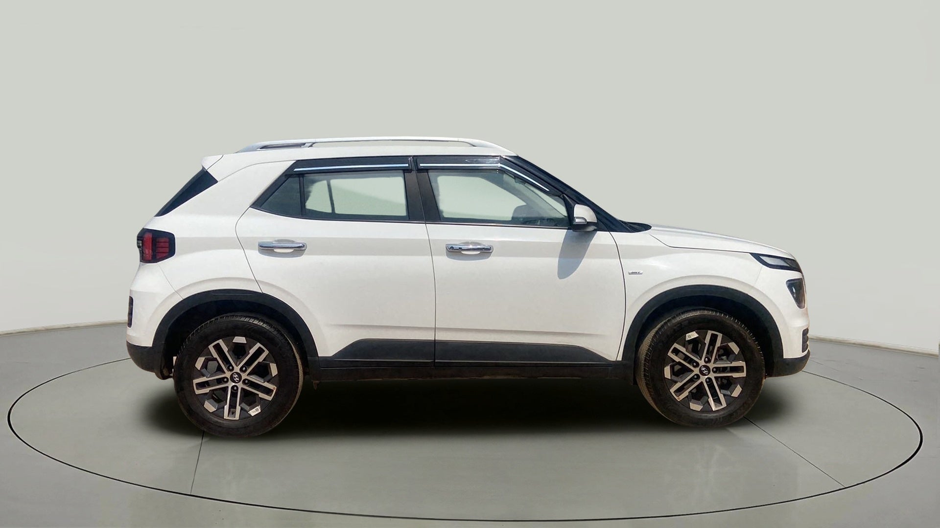 Side view of a atlas white Hyundai Venue