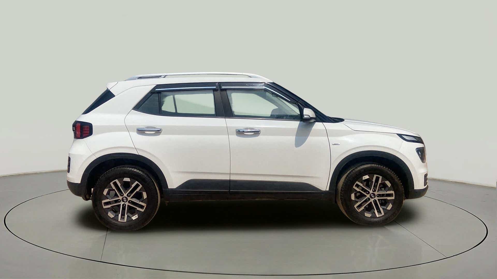 Side view of a atlas white Hyundai Venue