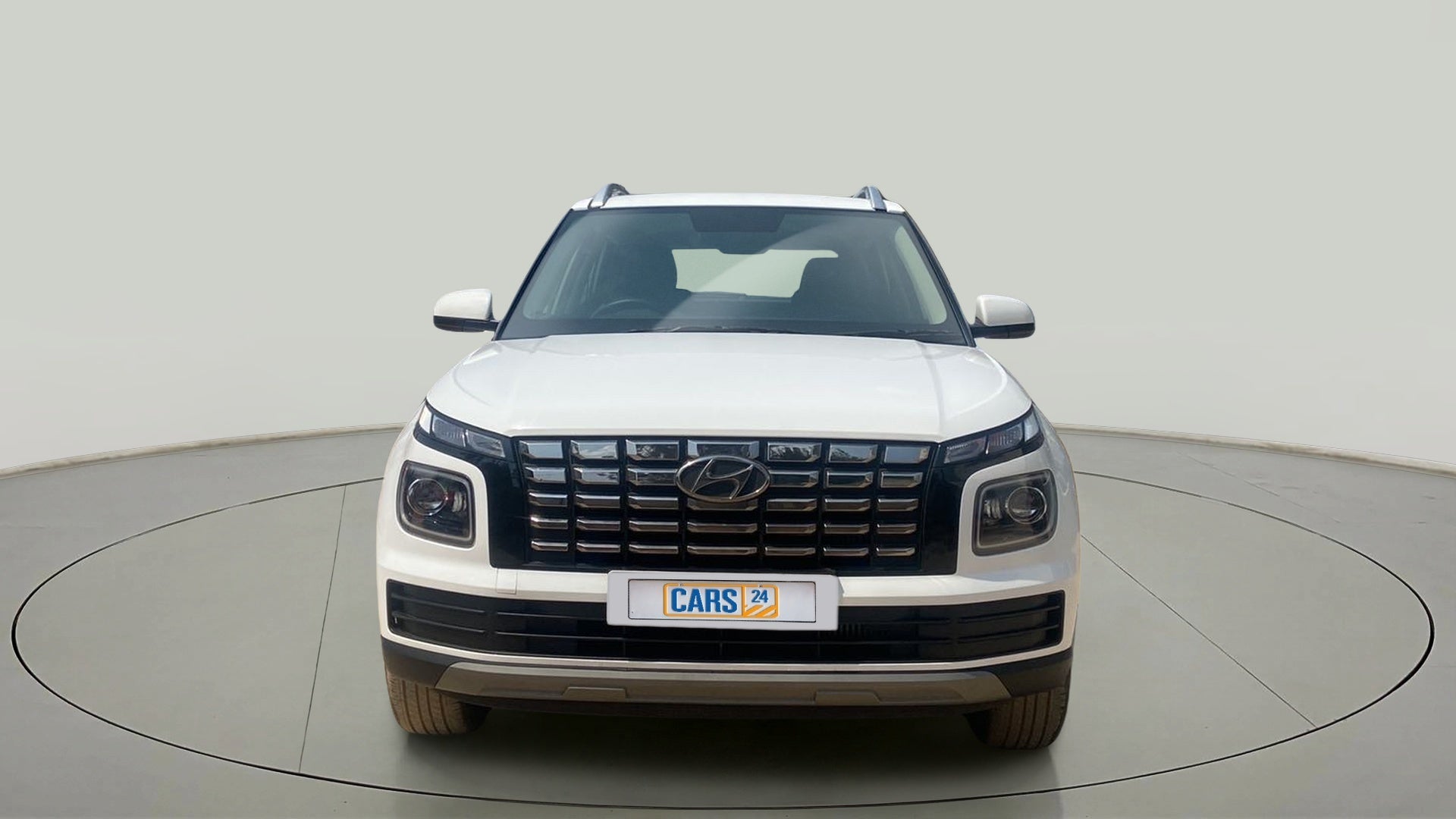 Front view of a Atlas White Hyundai Venue