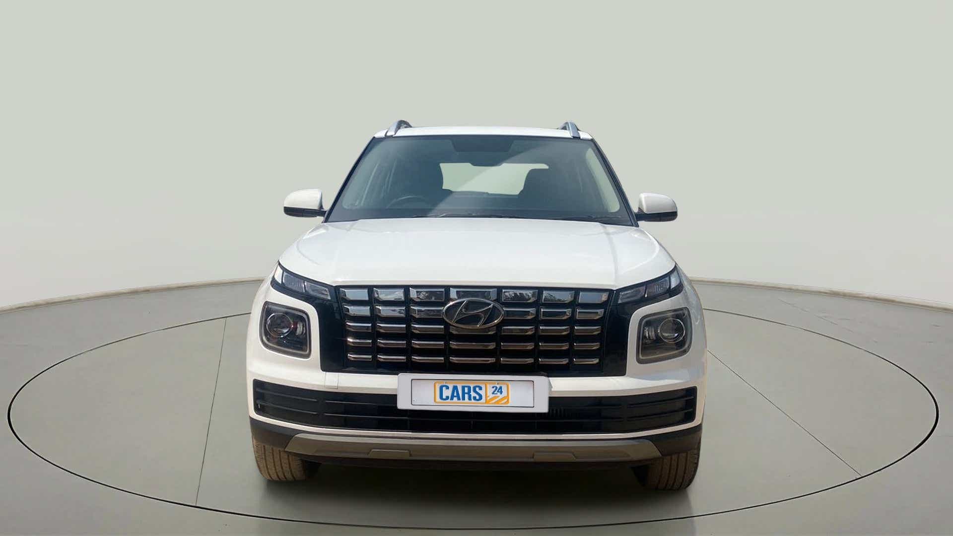 Front view of a Atlas White Hyundai Venue