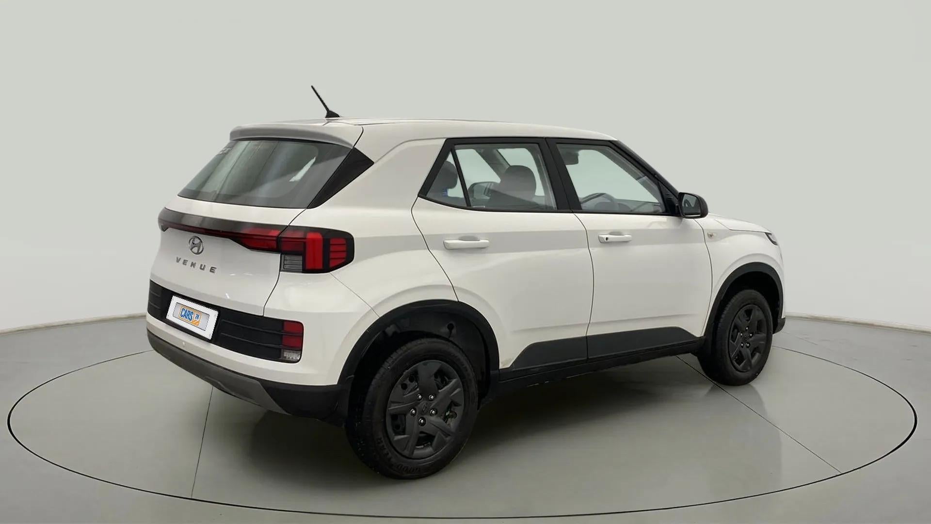 Rear three-quarter of a Atlas White Hyundai Venue