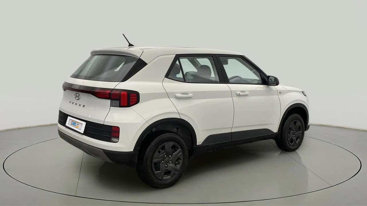 Rear three-quarter of a Atlas White Hyundai Venue