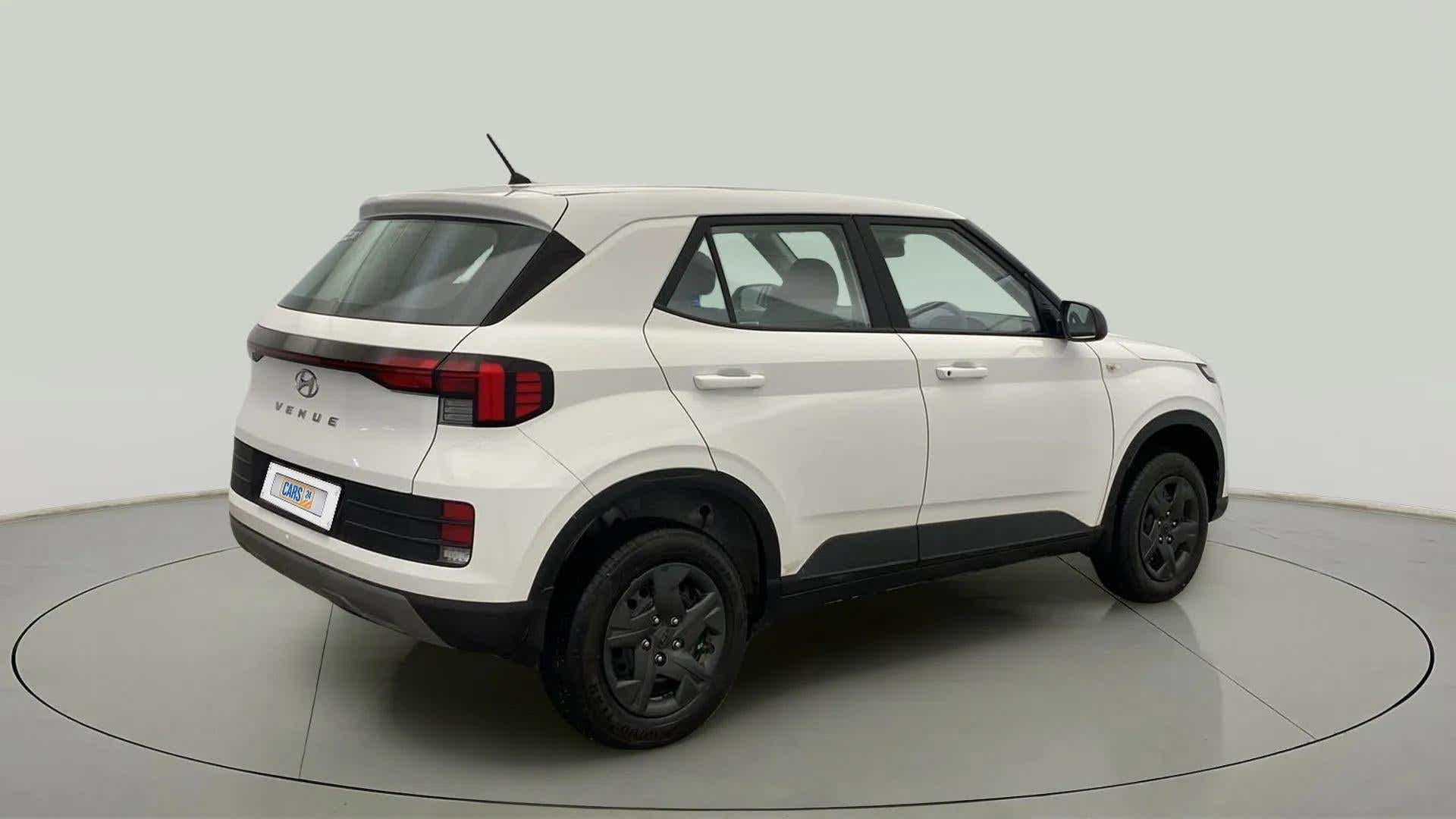 Rear three-quarter of a Atlas White Hyundai Venue