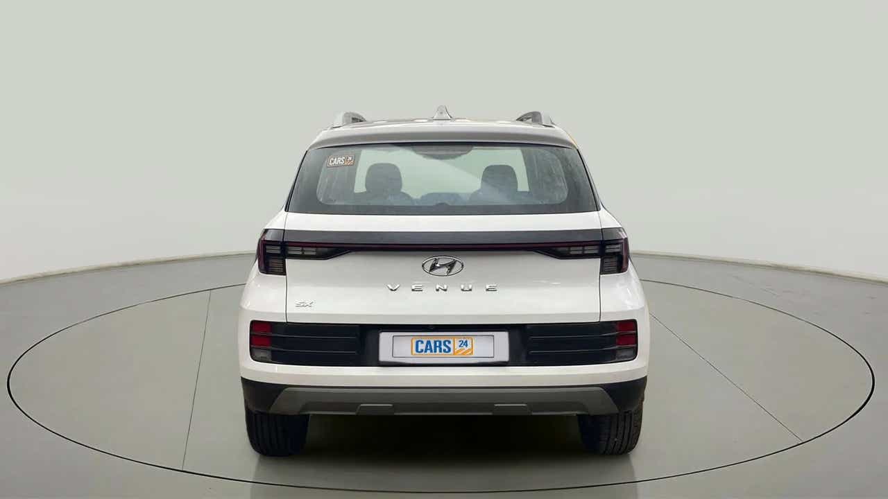 Rear view of a atlas white Hyundai Venue SX