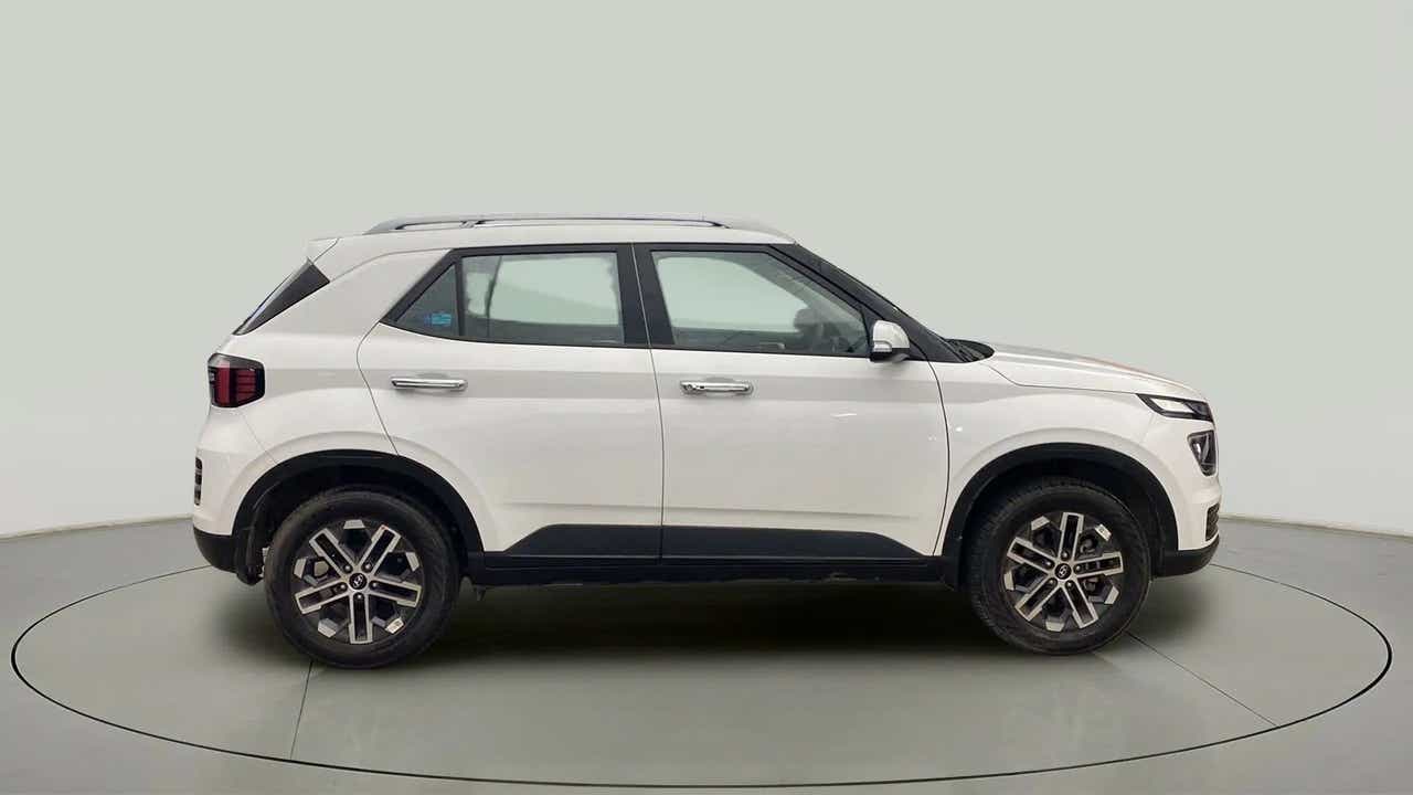 Side view of a Atlas White Hyundai Venue