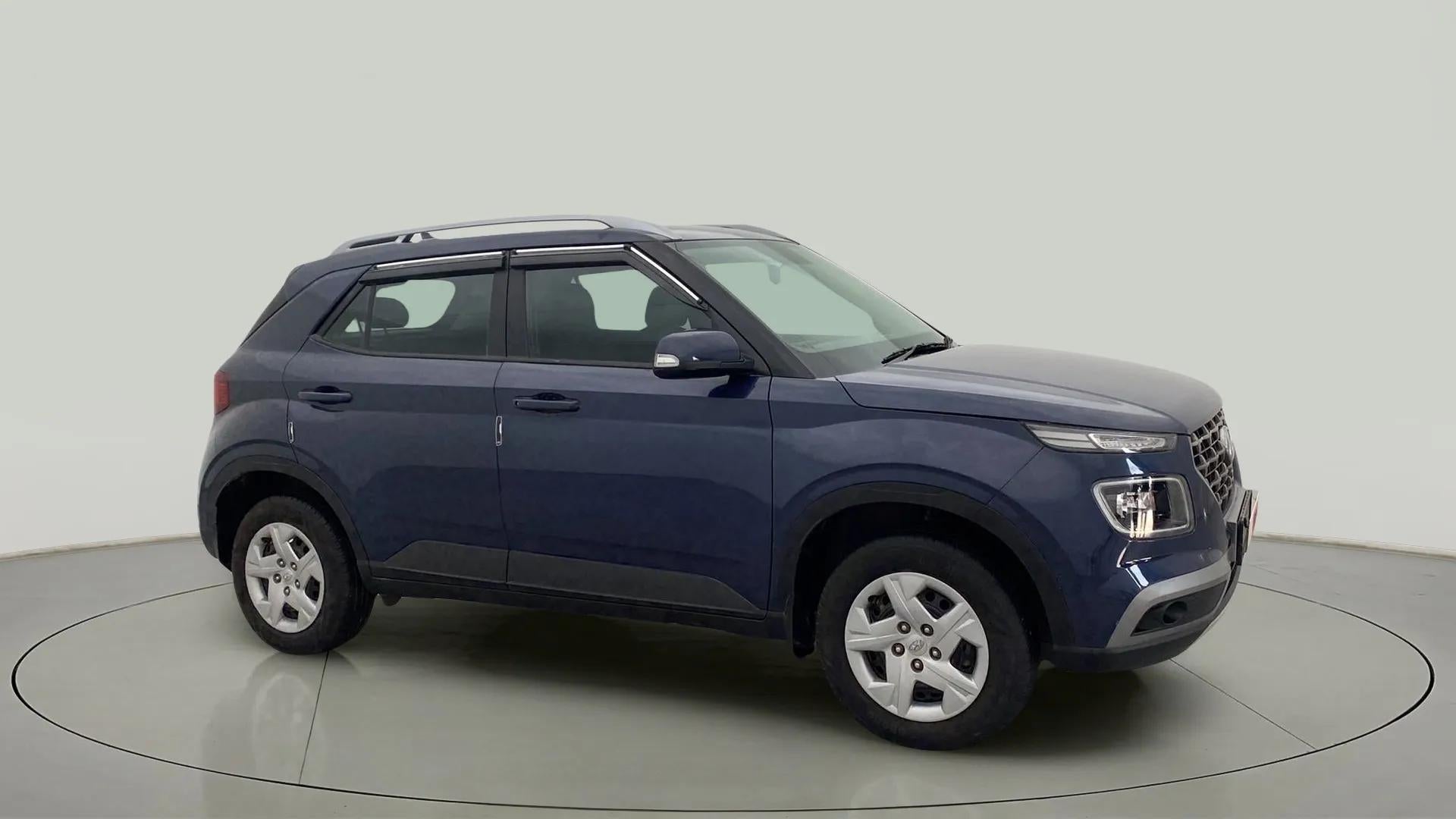 Side view of a Denim Blue Hyundai Venue