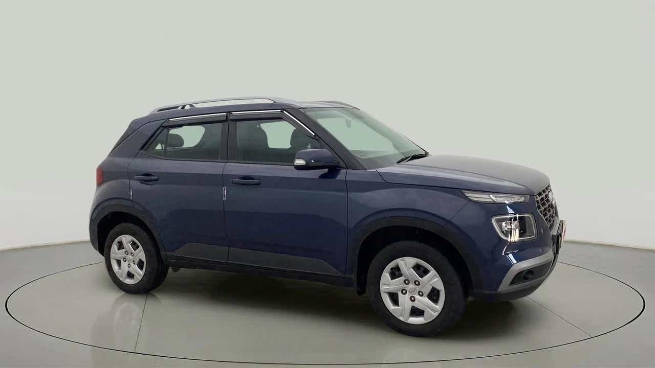 Side view of a Denim Blue Hyundai Venue