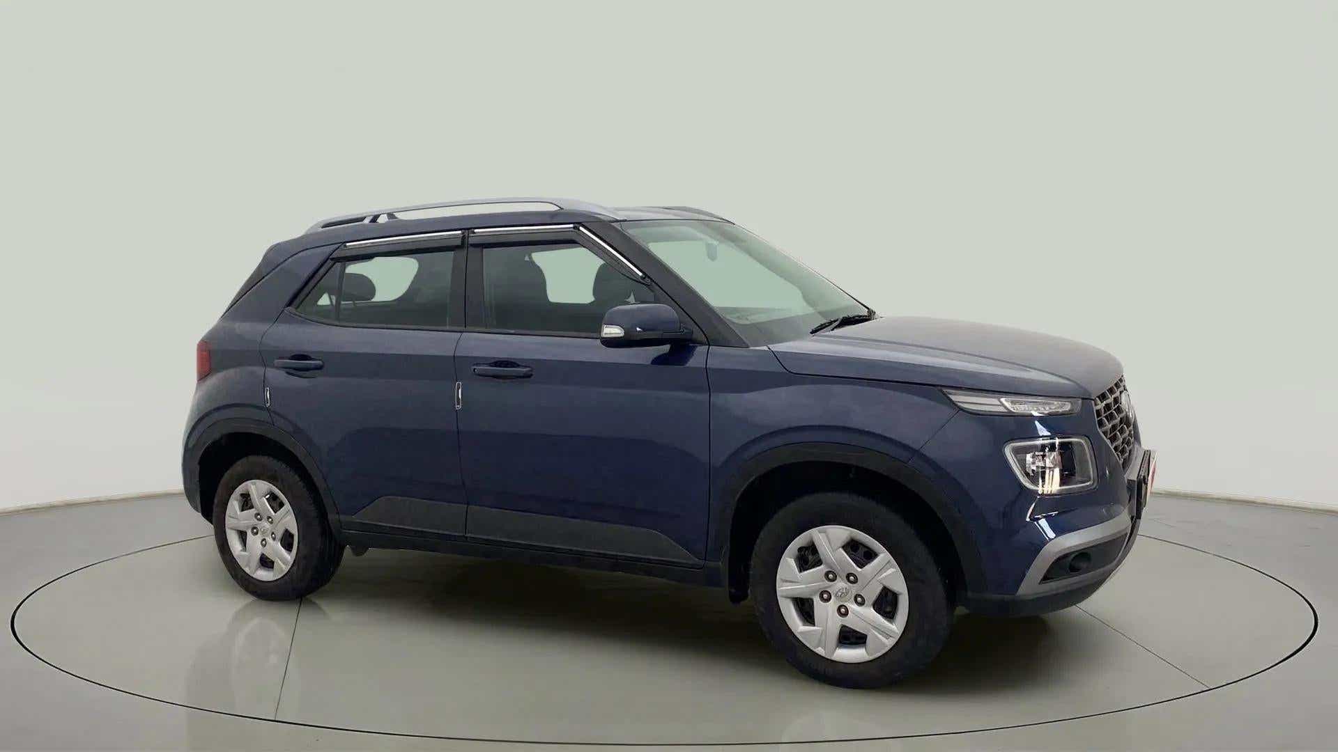 Side view of a Denim Blue Hyundai Venue