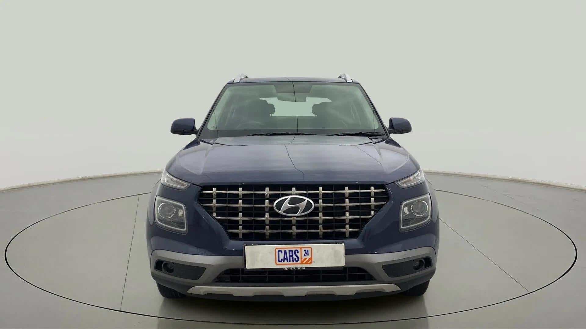 Front view of a Denim Blue Hyundai Venue
