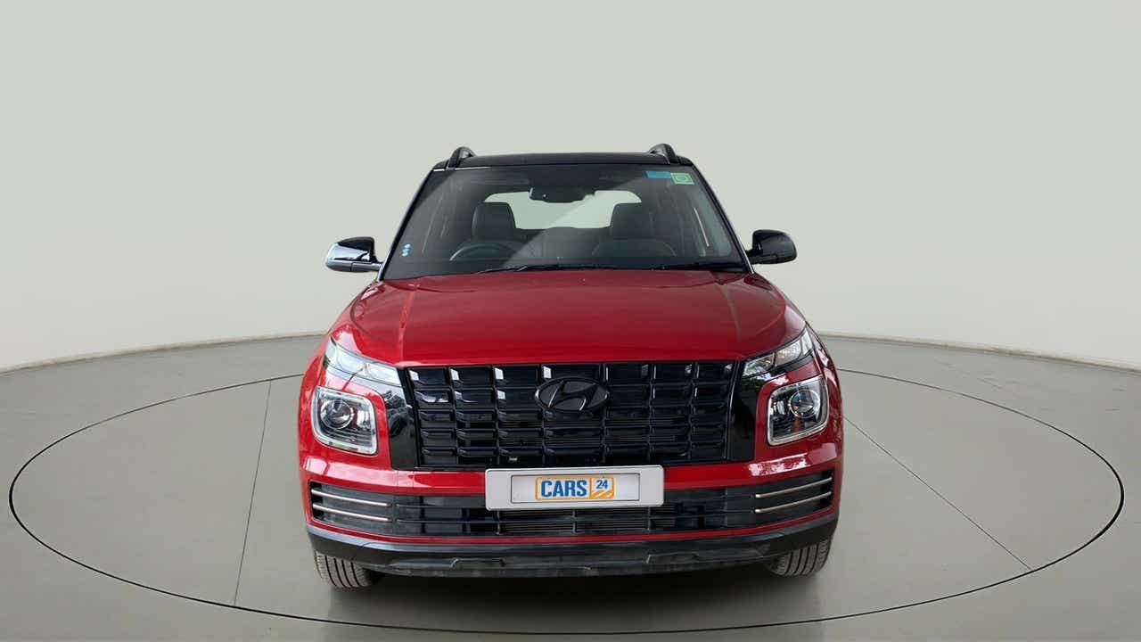 Front view of a Fiery Red Hyundai Venue