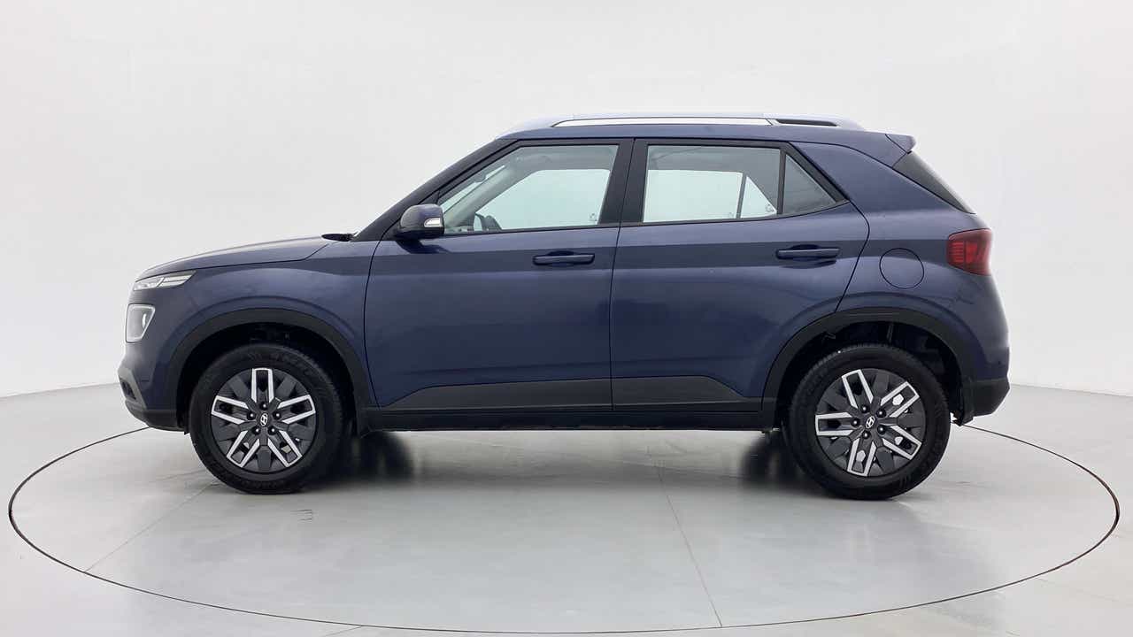 Side view of a denim blue Hyundai Venue
