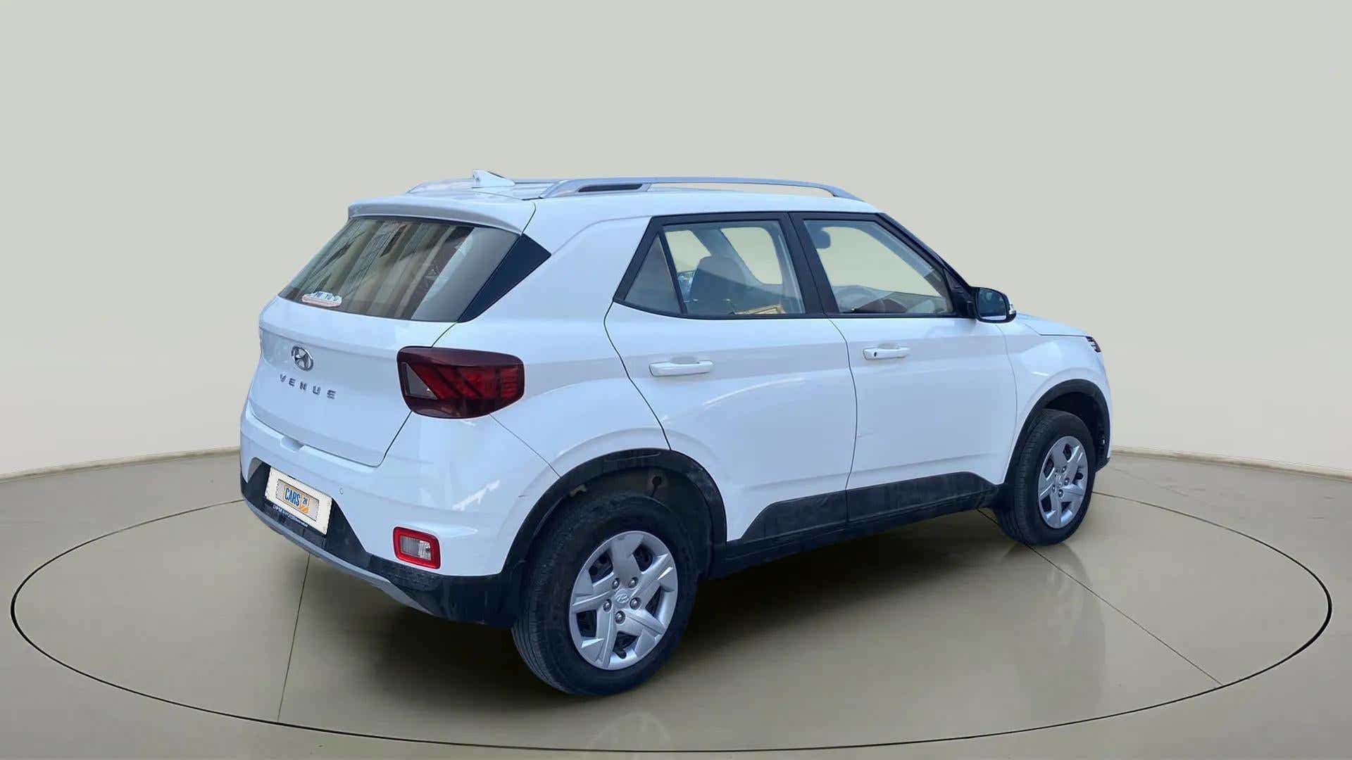 Rear three-quarter of a Atlas White Hyundai Venue